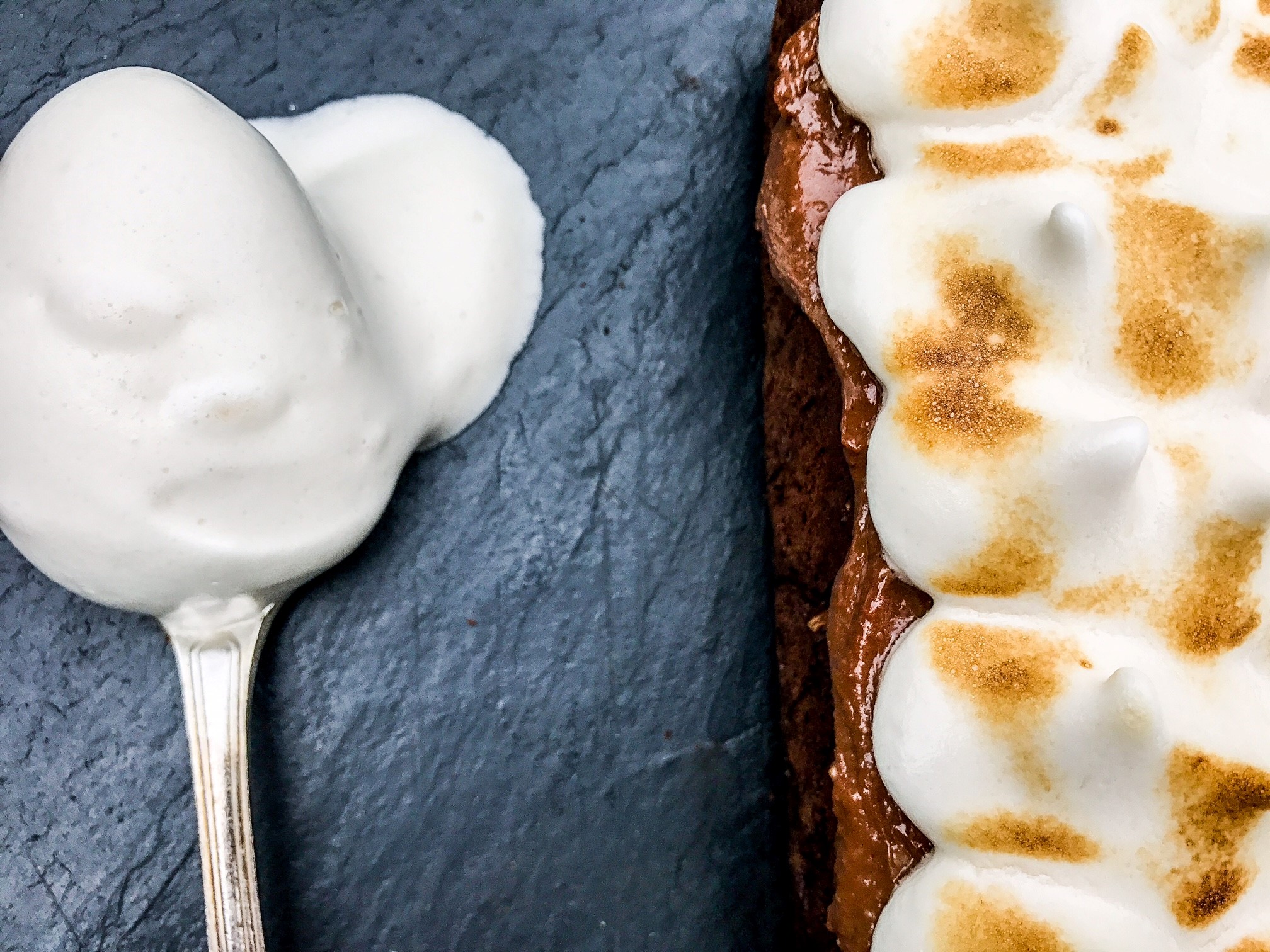 Nutty Brownies with Cashew Caramel and Meringue Frosting